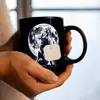 Sitzender Wolf im Mondschein Tasse in Schwarz Produktbild-Vorschau 7