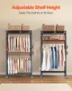 Two garment racks with clothes and accessories displayed. Produktbild-Vorschau