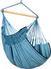 A hanging chair suspended from a wooden bar. Náhled obrázku produktu