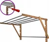 A wall-mounted retractable clothes drying rack. Produktbild-Vorschau