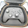 A black Xbox controller is shown inside its protective case. Podgląd zdjęcia produktu