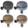 Four bicycle bells in different colors arranged in a grid. Produktbild-Vorschau