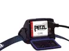 Close-up of a Petzl Core rechargeable battery being charged inside a headlamp. Náhled obrázku produktu