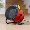 A red electric heater is placed on a wooden floor in front of a staircase. Náhled obrázku produktu