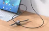 A tablet and a smartwatch are charging on a wooden desk. Podgląd zdjęcia produktu