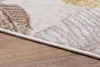 A close-up view of a rug with a modern design, showing its texture and edge. Anteprima dell’immagine prodotto