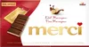 A chocolate bar package with a chocolate bar and a wrapper shown. Produktbild-Vorschau
