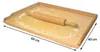 A wooden rolling pin on a wooden board with dough and flour. Produktbild-Vorschau