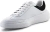 A white leather sneaker with black accents on a white background. Náhled obrázku produktu