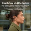 A woman wearing headphones outdoors. Voir les images du produit