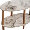 A close-up view of a two-tiered oval coffee table with a marble-like pattern on the surfaces and wooden legs. Náhľad obrázku produktu