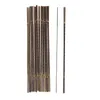 A bundle of thin metal rods with spiral patterns, standing upright. Podgląd zdjęcia produktu
