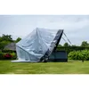 A clear plastic pool cover is draped over a pool structure in a grassy backyard. Náhľad obrázku produktu
