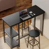A black bar table set with two stools and a laptop on it, placed in a room with wooden flooring and a cream rug. Náhľad obrázku produktu