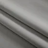 A close-up, folded view of gray fabric, likely curtains. Produktbild-Vorschau