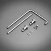 A collection of chrome-plated plumbing fixtures and hardware laid out on a gray background. Podgląd zdjęcia produktu
