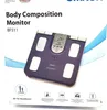 The image shows the packaging of an Omron BF511 Body Composition Monitor. Podgląd zdjęcia produktu