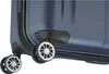 A close-up view of the wheels and lower corner of a blue suitcase. Náhľad obrázku produktu
