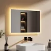 A modern bathroom vanity with a lit mirror above a sink. Anteprima dell’immagine prodotto