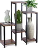A multi-tiered plant stand with decorative items. Anteprima dell’immagine prodotto