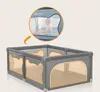 A baby playing in a playpen, with a close-up view of the playpen and the baby inside. Anteprima dell’immagine prodotto