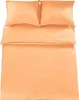 A neatly folded bedding set, including two pillowcases and a duvet cover, laid out on a flat surface. Produktbild-Vorschau