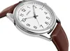 A close-up, angled view of a Casio watch with a white face and a brown leather strap, set against a white background. Produktbild-Vorschau