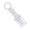 A clear product shot of a plastic feeding syringe with a loop handle and a clear tip. Produktbild-Vorschau