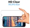 A hand is holding a screen protector over a smartphone. Produktbild-Vorschau
