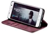 A smartphone in a burgundy flip case, displaying a movie poster on its screen. Produktbild-Vorschau