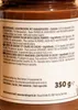 Close-up of a food product label with multiple languages. Produktbild-Vorschau