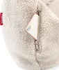 A close-up view of a fluffy cream-colored bag with a smartphone partially inserted into a zippered pocket. Náhled obrázku produktu