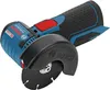 A close-up studio shot of a cordless angle grinder. Voir les images du produit