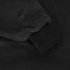 A close-up view of the cuff and sleeve of a black fuzzy hoodie. Náhled obrázku produktu