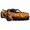 An orange and black toy car. Anteprima dell’immagine prodotto