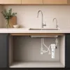 Under-sink water filter system installed in a kitchen. Podgląd zdjęcia produktu