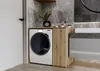 A modern bathroom with a washing machine and a custom cabinet. Produktbild-Vorschau