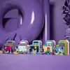 A collection of LEGO Friends camper vans and figures arranged on a purple surface with a large purple ring and pineapple in the background. Anteprima dell’immagine prodotto