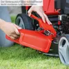 Hands are shown attaching a red side discharge chute to a lawnmower. Produktbild-Vorschau