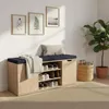 A shoe cabinet with a bench seat in a hallway, next to a potted plant and framed artwork. Náhľad obrázku produktu