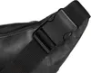 Close-up of a black leather fanny pack strap and buckle. Voir les images du produit