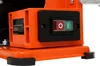 A close-up view of the power switch on an orange machine. Voir les images du produit