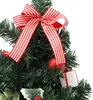 A close-up view of a decorated artificial Christmas tree. Náhled obrázku produktu