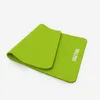 A bright green yoga mat is shown on a white background. Produktbild-Vorschau