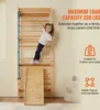 A young girl is climbing a wooden wall ladder with a slide attachment. Text overlays highlight product features and benefits. Podgląd zdjęcia produktu