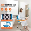 A woman is sitting on a rotating shower chair in a bathroom. Anteprima dell’immagine prodotto