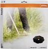 Packaging for a STIHL GrassCut blade, showing a person using a grass trimmer. Produktbild-Vorschau