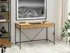 A modern home office setup featuring a wooden desk with black metal legs, a laptop, and a desk lamp. Náhled obrázku produktu