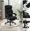 A black office chair is shown in a room with a large window and a plant. Insets highlight features of the chair. Náhled obrázku produktu