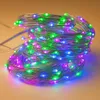 A coiled string of LED lights with green, blue, and purple LEDs. Podgląd zdjęcia produktu